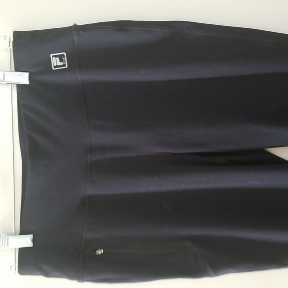 Fila Women's sport leggings with reflector strips zippers at bottom - Picture 2 of 7